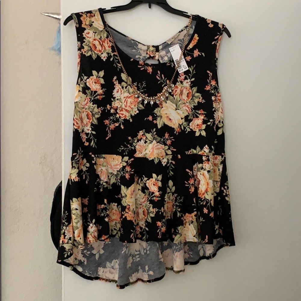 Free kisses peplum sleeveless top